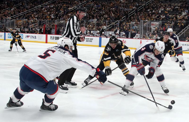 Jan 7, 2025; Pittsburgh, Pennsylvania, USA; Columbus Blue Jackets defenseman Denton Mateychuk (5) and center Cole Sillinger (4) fight for the puck against Pittsburgh Penguins center Cody Glass (19) after a face-off during the third period at PPG Paints Arena. Mandatory Credit: Charles LeClaire-Imagn Images