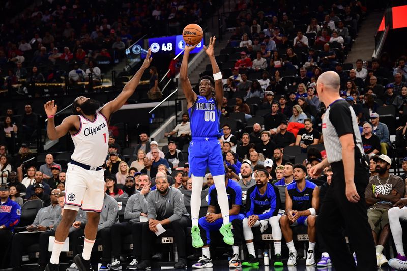 INGLEWOOD, CA - OCTOBER 14: Jazian Gortman #00 of the Dallas Mavericks shoots a three point basket during the game against the LA Clippers during a NBA Preseason game on October 14, 2024 at the Intuit Dome in Inglewood, California. NOTE TO USER: User expressly acknowledges and agrees that, by downloading and/or using this Photograph, user is consenting to the terms and conditions of the Getty Images License Agreement. Mandatory Copyright Notice: Copyright 2024 NBAE (Photo by Adam Pantozzi/NBAE via Getty Images)