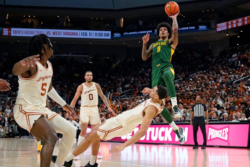 Jan 30, 2023; Austin, Texas, USA; Baylor Bears forward Jalen Bridges (11) shoots over Texas Longhorns forward Dylan Disu (1) during the second half at Moody Center. Mandatory Credit: Scott Wachter-USA TODAY Sports