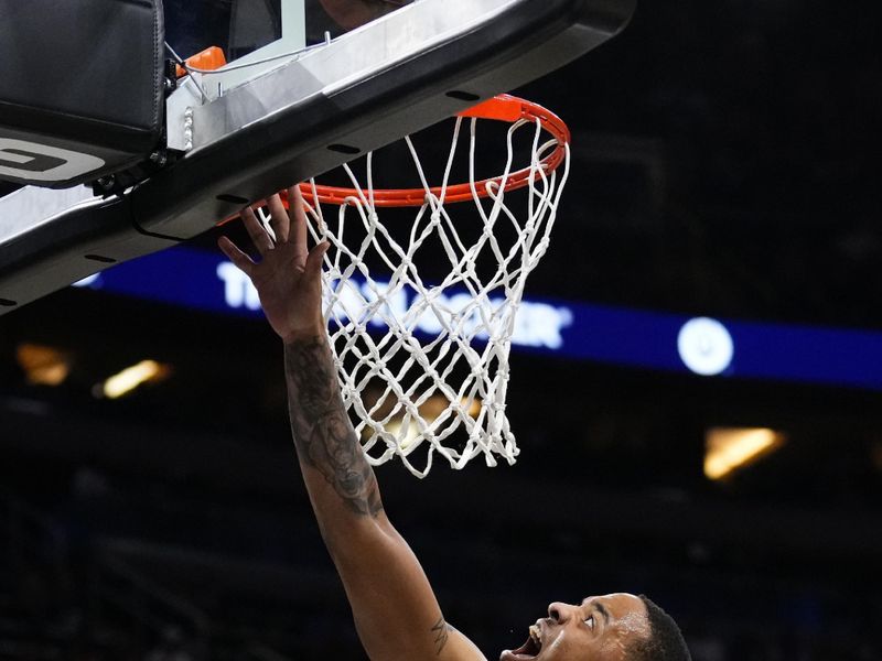 ORLANDO, FLORIDA - FEBRUARY 10: Markelle Fultz #20 of the Orlando Magic goes up for a shot against Coby White #0 of the Chicago Bulls during the first quarter at Kia Center on February 10, 2024 in Orlando, Florida. NOTE TO USER: User expressly acknowledges and agrees that, by downloading and or using this photograph, user is consenting to the terms and conditions of the Getty Images License Agreement. (Photo by Rich Storry/Getty Images)