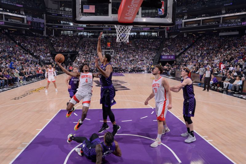 SACRAMENTO, CA - MARCH 10: Jalen Green #4 of the Houston Rockets drives to the basket during the game against the Sacramento Kings on March 10, 2024 at Golden 1 Center in Sacramento, California. NOTE TO USER: User expressly acknowledges and agrees that, by downloading and or using this Photograph, user is consenting to the terms and conditions of the Getty Images License Agreement. Mandatory Copyright Notice: Copyright 2024 NBAE (Photo by Rocky Widner/NBAE via Getty Images)