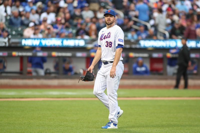 Jun 3, 2023; New York City, New York, USA;  New York Mets starting pitcher Tylor Megill (38) walks off the field after being taken out of the game in the sixth inning against the Toronto Blue Jays at Citi Field. Mandatory Credit: Wendell Cruz-USA TODAY Sports