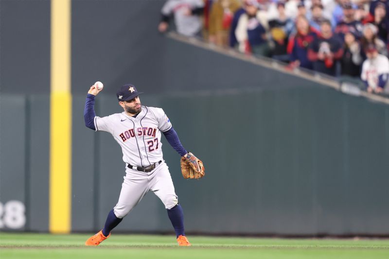 Oct 11, 2023; Minneapolis, Minnesota, USA; Houston Astros second baseman Jose Altuve (27) throws to first for  another ut in the third inning against the Minnesota Twins  during game four of the ALDS for the 2023 MLB playoffs at Target Field. Mandatory Credit: Jesse Johnson-USA TODAY Sports