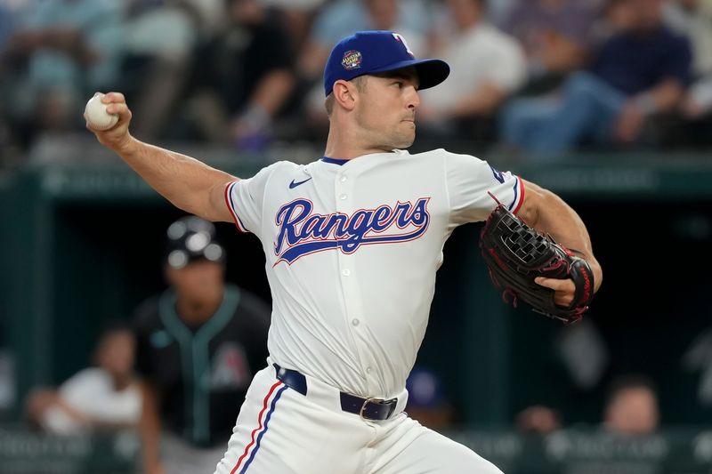 May 29, 2024; Arlington, Texas, USA; Texas Rangers relief pitcher David Robertson (37) delivers a pitch to the Arizona Diamondbacks during the eighth inning at Globe Life Field. Mandatory Credit: Jim Cowsert-USA TODAY Sports