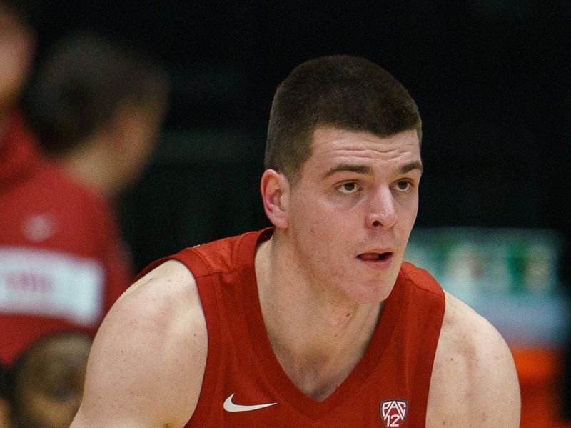 Feb 23, 2023; Stanford, California, USA;  Washington State Cougars forward Andrej Jakimovski (23) dribbles the ball against the Stanford Cardinal during the first half at Maples Pavilion. Mandatory Credit: Neville E. Guard-USA TODAY Sports