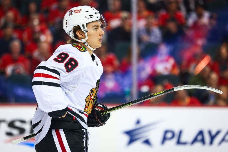 Oct 15, 2024; Calgary, Alberta, CAN; Chicago Blackhawks center Connor Bedard (98) during the first period against the Calgary Flames at Scotiabank Saddledome. Mandatory Credit: Sergei Belski-Imagn Images