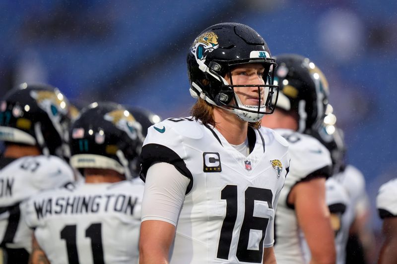 Jacksonville Jaguars quarterback Trevor Lawrence warms up before an NFL football game against the Buffalo Bills, Monday, Sept. 23, 2024, in Orchard Park, NY. (AP Photo/Steven Senne)