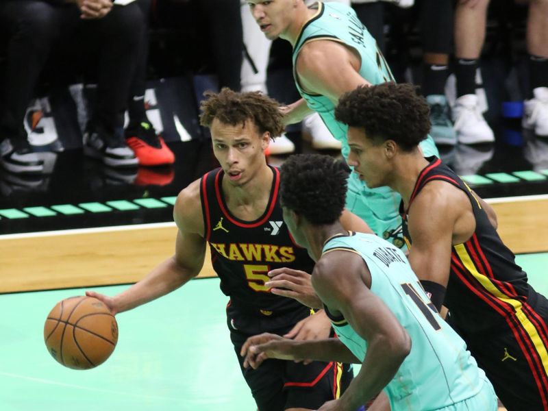 CHARLOTTE, NC - NOVEMBER 30: Dyson Daniels #5 of the Atlanta Hawks dribbles the ball during the game against the Charlotte Hornets on November 30, 2024 at Spectrum Center in Charlotte, North Carolina. NOTE TO USER: User expressly acknowledges and agrees that, by downloading and or using this photograph, User is consenting to the terms and conditions of the Getty Images License Agreement. Mandatory Copyright Notice: Copyright 2024 NBAE (Photo by Brock Williams-Smith/NBAE via Getty Images)