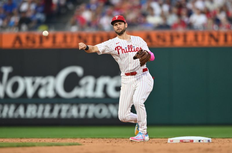 Aug 17, 2024; Philadelphia, Pennsylvania, USA; Philadelphia Phillies shortstop Trea Turner (7) throws to first against the Washington Nationals in the second inning at Citizens Bank Park. Mandatory Credit: Kyle Ross-USA TODAY Sports