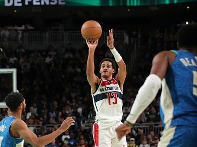 MILWAUKEE, WI - NOVEMBER 24: Jordan Poole #13 of the Washington Wizards shoots a three point basket against the Milwaukee Bucks during the In-Season Tournament on November 24, 2023 at the Fiserv Forum Center in Milwaukee, Wisconsin. NOTE TO USER: User expressly acknowledges and agrees that, by downloading and or using this Photograph, user is consenting to the terms and conditions of the Getty Images License Agreement. Mandatory Copyright Notice: Copyright 2023 NBAE (Photo by Gary Dineen/NBAE via Getty Images).