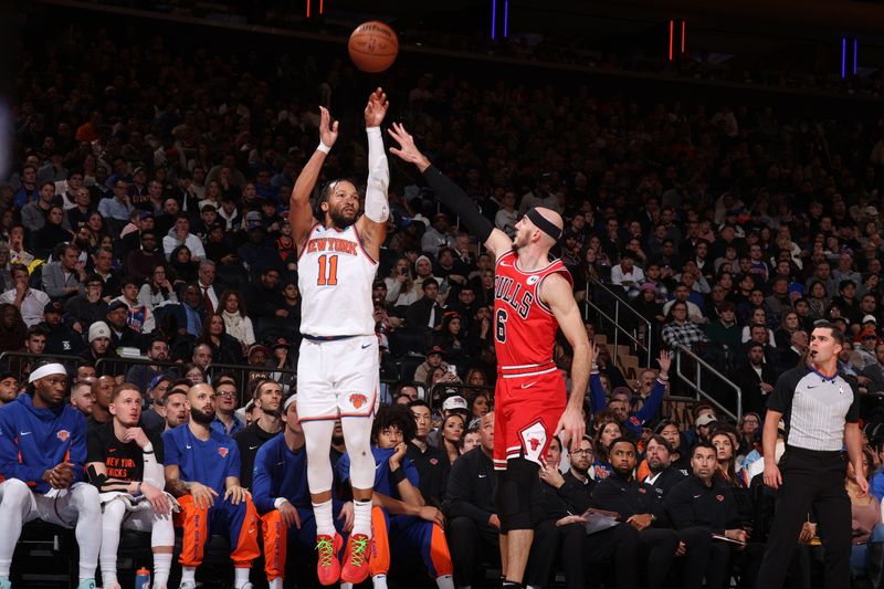 NEW YORK, NY - JANUARY 3: Jalen Brunson #11 of the New York Knicks shoots a three point basket against the Chicago Bulls on January 3, 2024 at Madison Square Garden in New York City, New York.  NOTE TO USER: User expressly acknowledges and agrees that, by downloading and or using this photograph, User is consenting to the terms and conditions of the Getty Images License Agreement. Mandatory Copyright Notice: Copyright 2024 NBAE  (Photo by Nathaniel S. Butler/NBAE via Getty Images)