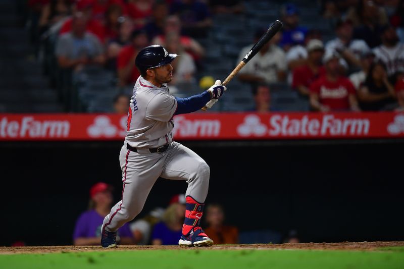 August 16, 2024; Anaheim, California, USA; Atlanta Braves right fielder Ramon Laureano (18) hits a single against the Los Angeles Angels during the eighth inning at Angel Stadium. Mandatory Credit: Gary A. Vasquez-USA TODAY Sports