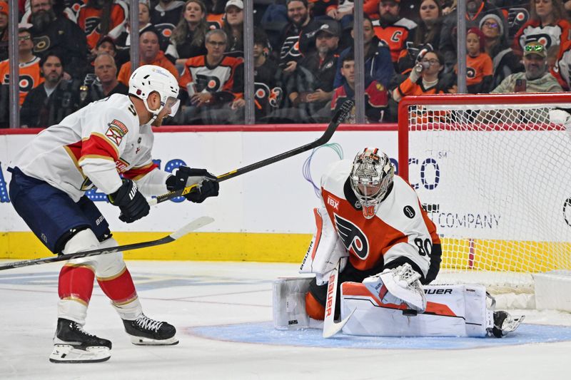 Oct 13, 2025; Philadelphia, Pennsylvania, USA; Philadelphia Flyers goaltender Dan Vladar (80) makes a save against Florida Panthers center Sam Bennett (9) during the third period at Wells Fargo Center. Mandatory Credit: Eric Hartline-Imagn Images