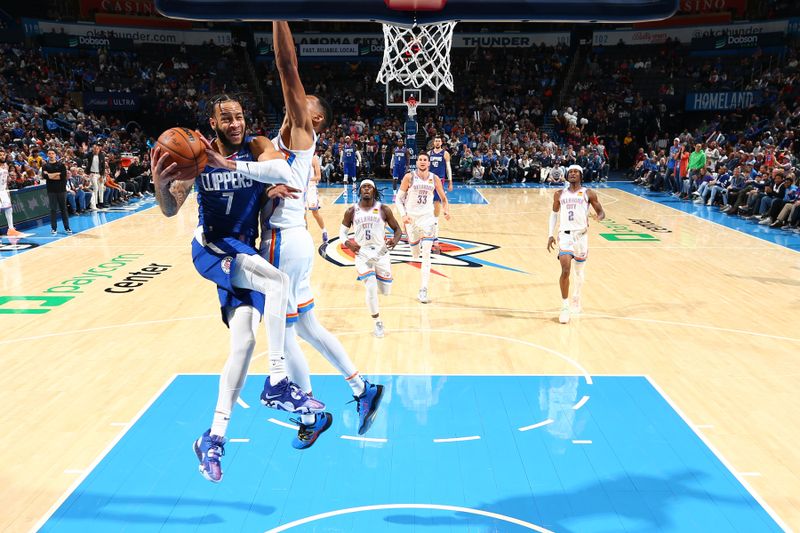 OKLAHOMA CITY, OK - OCTOBER 25: Amir Coffey #7 of the LA Clippers drives to the basket during the game against the Oklahoma City Thunder on October 25, 2022 at Paycom Arena in Oklahoma City, Oklahoma. NOTE TO USER: User expressly acknowledges and agrees that, by downloading and or using this photograph, User is consenting to the terms and conditions of the Getty Images License Agreement. Mandatory Copyright Notice: Copyright 2022 NBAE (Photo by Zach Beeker/NBAE via Getty Images)