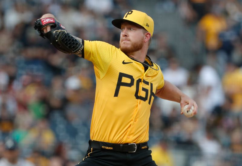 May 24, 2024; Pittsburgh, Pennsylvania, USA;  Pittsburgh Pirates starting pitcher Bailey Falter (26) delivers a pitch against the Atlanta Braves during the first inning at PNC Park. Mandatory Credit: Charles LeClaire-USA TODAY Sports