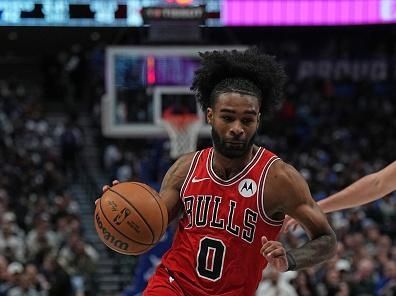 DALLAS, TX - NOVEMBER 1: Coby White #0 of the Chicago Bulls drives to the basket during the game against the Dallas Mavericks on November 1, 2023 at the American Airlines Center in Dallas, Texas. NOTE TO USER: User expressly acknowledges and agrees that, by downloading and or using this photograph, User is consenting to the terms and conditions of the Getty Images License Agreement. Mandatory Copyright Notice: Copyright 2023 NBAE (Photo by Glenn James/NBAE via Getty Images)