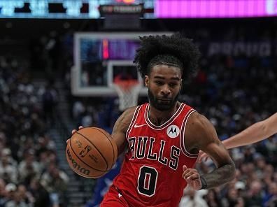 DALLAS, TX - NOVEMBER 1: Coby White #0 of the Chicago Bulls drives to the basket during the game against the Dallas Mavericks on November 1, 2023 at the American Airlines Center in Dallas, Texas. NOTE TO USER: User expressly acknowledges and agrees that, by downloading and or using this photograph, User is consenting to the terms and conditions of the Getty Images License Agreement. Mandatory Copyright Notice: Copyright 2023 NBAE (Photo by Glenn James/NBAE via Getty Images)