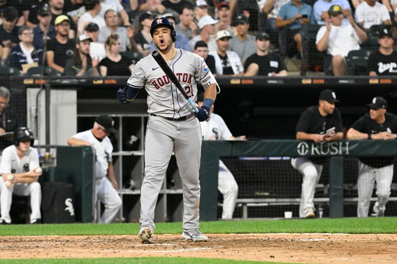 Jun 19, 2024; Chicago, Illinois, USA;  Houston Astros catcher Yainer Diaz (21) reacts after striking out swinging during the fifth inning at Guaranteed Rate Field. Mandatory Credit: Matt Marton-USA TODAY Sports