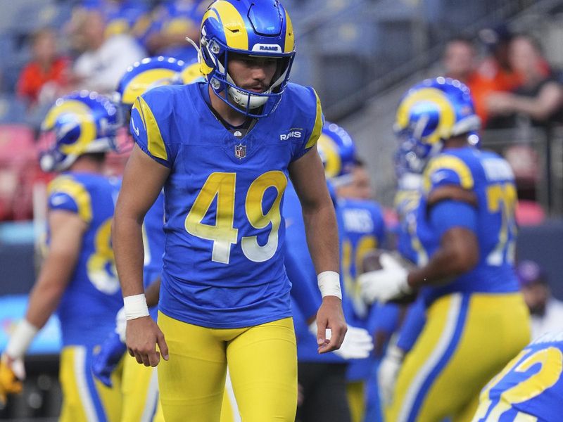 Los Angeles Rams place kicker Tanner Brown (49) against the Denver Broncos of an NFL football game Saturday, Aug 26, 2023, in Denver. (AP Photo/Bart Young)