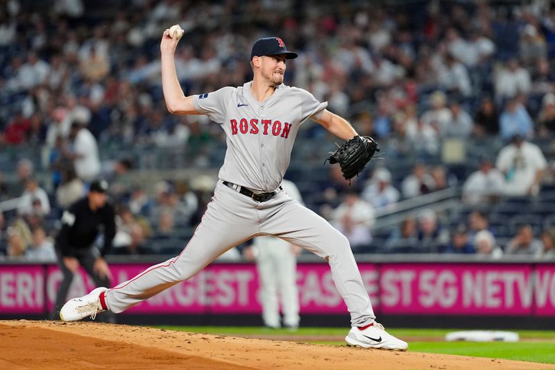 Sep 12, 2024; Bronx, New York, USA; Boston Red Sox pitcher Cooper Criswell (64) delivers a pitch against the New York Yankees during the first inning at Yankee Stadium. Mandatory Credit: Gregory Fisher-Imagn Images