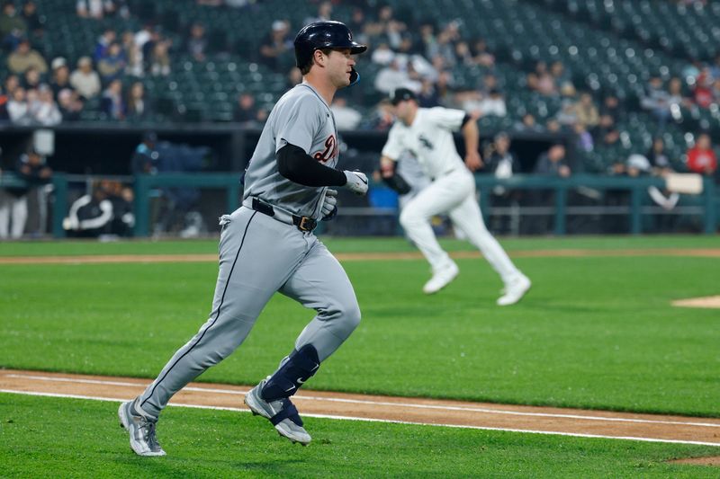 Jun 4, 2025; Chicago, Illinois, USA; Detroit Tigers catcher Dillon Dingler (13) runs after hitting an RBI-single against the Chicago White Sox during the first inning at Rate Field. Mandatory Credit: Kamil Krzaczynski-Imagn Images
