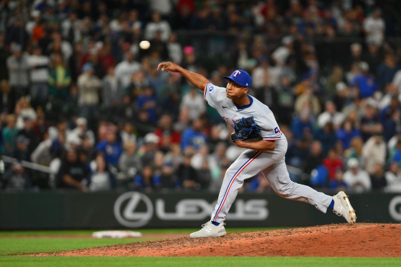 Sep 14, 2024; Seattle, Washington, USA; Texas Rangers relief pitcher Jose Leclerc (25) pitches to the Seattle Mariners during the ninth inning at T-Mobile Park. Mandatory Credit: Steven Bisig-Imagn Images