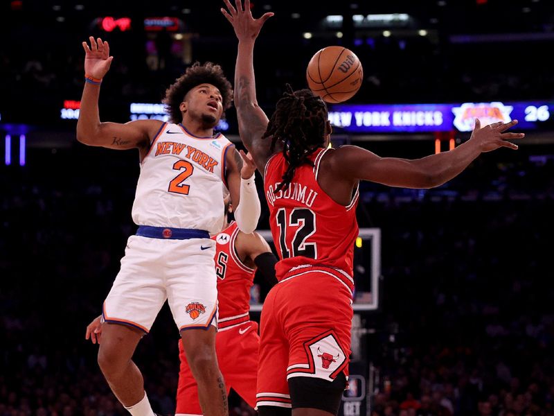 NEW YORK, NEW YORK - JANUARY 03: Ayo Dosunmu #12 of the Chicago Bulls makes the steal from Miles McBride #2 of the New York Knicks during the first half at Madison Square Garden on January 03, 2024 in New York City. NOTE TO USER: User expressly acknowledges and agrees that, by downloading and or using this photograph, User is consenting to the terms and conditions of the Getty Images License Agreement. (Photo by Elsa/Getty Images)