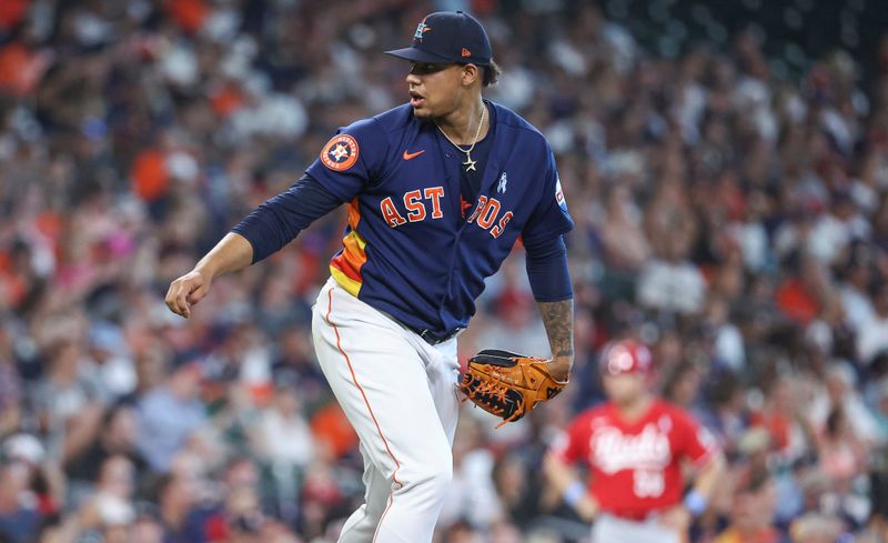 Jun 18, 2023; Houston, Texas, USA; Houston Astros relief pitcher Bryan Abreu (52) reacts after a pitch during the eighth inning against the Cincinnati Reds at Minute Maid Park. Mandatory Credit: Troy Taormina-USA TODAY Sports