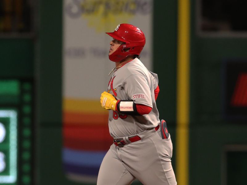 Apr 7, 2025; Pittsburgh, Pennsylvania, USA;  St. Louis Cardinals catcher Yohel Pozo (63) circles the bases on a solo home run against the Pittsburgh Pirates during the sixth inning at PNC Park. Mandatory Credit: Charles LeClaire-Imagn Images