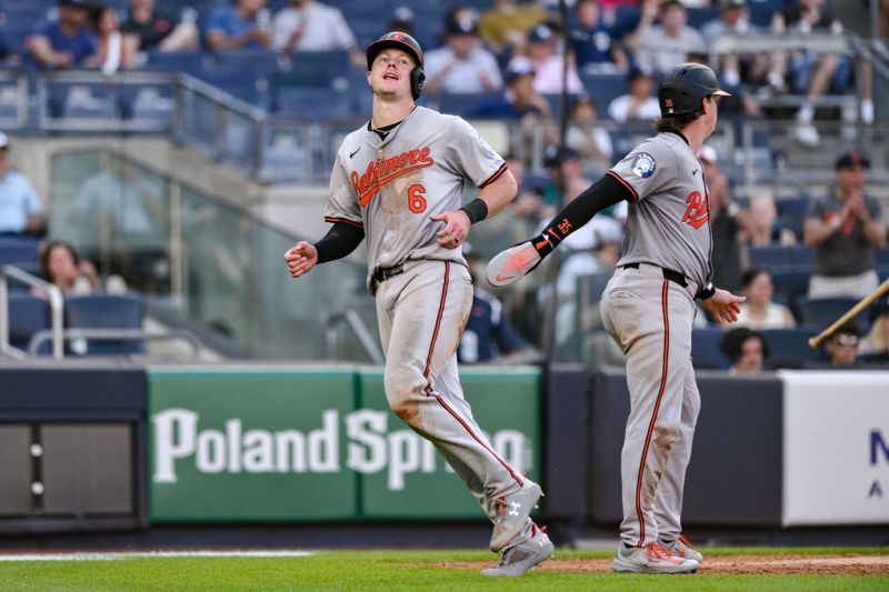 Jun 20, 2024; Bronx, New York, USA; Baltimore Orioles first baseman Ryan Mountcastle (6) scores a run on a two-RBI single by first baseman Ryan O'Hearn (not pictured) during the eighth inning against the New York Yankees at Yankee Stadium. Mandatory Credit: John Jones-USA TODAY Sports