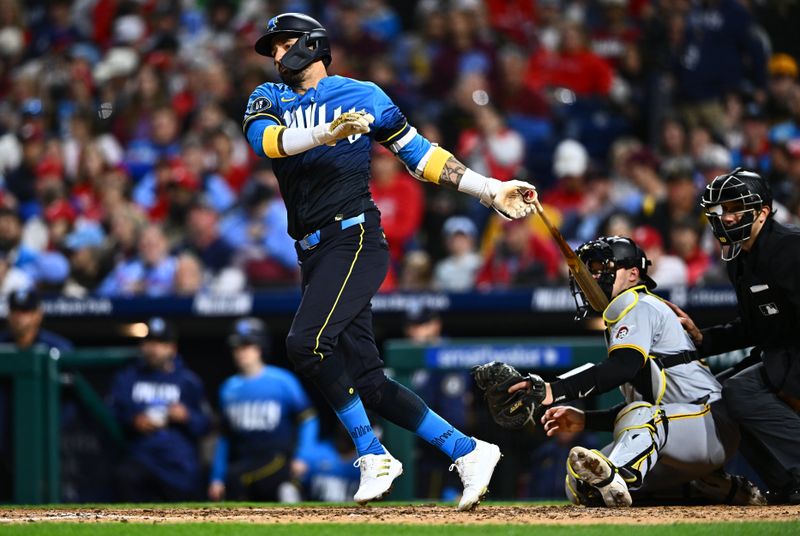 Apr 12, 2024; Philadelphia, Pennsylvania, USA; Philadelphia Phillies outfielder Nick Castellanos (8) hits an infield single against the Pittsburgh Pirates in the seventh inning at Citizens Bank Park. Mandatory Credit: Kyle Ross-USA TODAY Sports