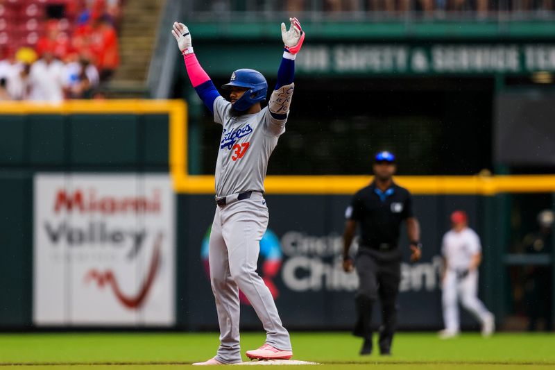 May 26, 2024; Cincinnati, Ohio, USA; Los Angeles Dodgers outfielder Teoscar Hernandez (37) reacts after hitting a double against the Cincinnati Reds in the seventh inning at Great American Ball Park. Mandatory Credit: Katie Stratman-USA TODAY Sports