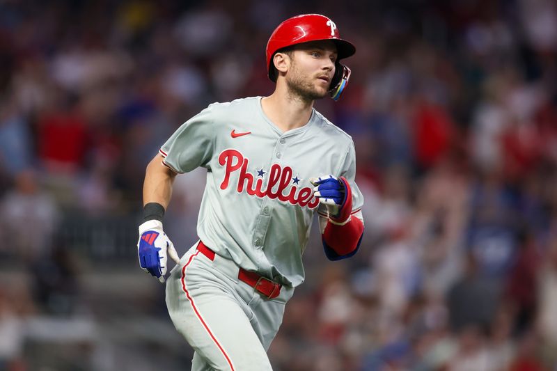 Jul 5, 2024; Atlanta, Georgia, USA; Philadelphia Phillies shortstop Trea Turner (7) hits a two-run home run against the Atlanta Braves in the sixth inning at Truist Park. Mandatory Credit: Brett Davis-USA TODAY Sports