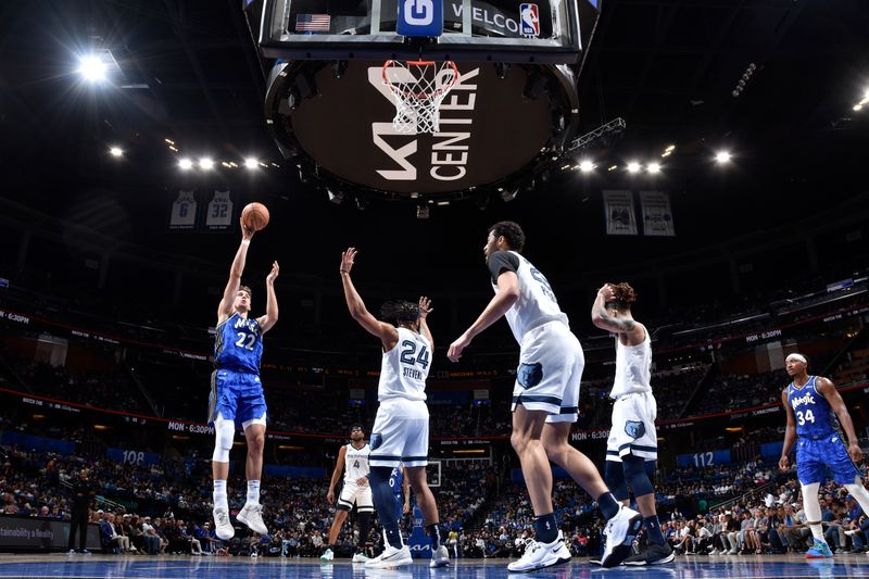 ORLANDO, FL - MARCH 30: Franz Wagner #22 of the Orlando Magic shoots the ball during the game against the Memphis Grizzlies on March 30, 2024 at the Kia Center in Orlando, Florida. NOTE TO USER: User expressly acknowledges and agrees that, by downloading and or using this photograph, User is consenting to the terms and conditions of the Getty Images License Agreement. Mandatory Copyright Notice: Copyright 2024 NBAE (Photo by Fernando Medina/NBAE via Getty Images)