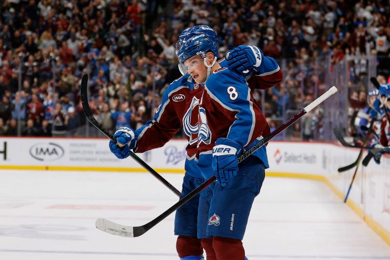 Nov 20, 2025; Denver, Colorado, USA; Colorado Avalanche defenseman Cale Makar (8) celebrates his goal with center Martin Necas (88) in the second period against the New York Rangers at Ball Arena. Mandatory Credit: Isaiah J. Downing-Imagn Images