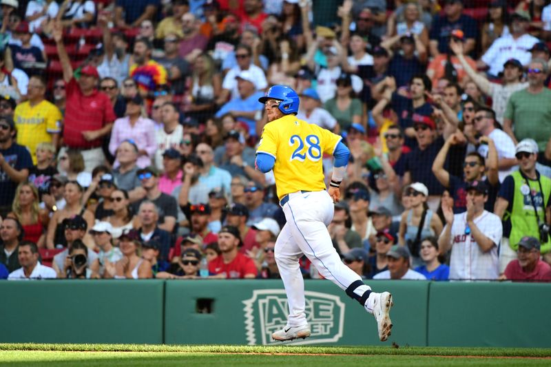 Aug 10, 2024; Boston, Massachusetts, USA;  Boston Red Sox catcher Danny Jansen (28) watches his home run go into the green monster seats during the fifth inning against the Houston Astros at Fenway Park. Mandatory Credit: Bob DeChiara-USA TODAY Sports