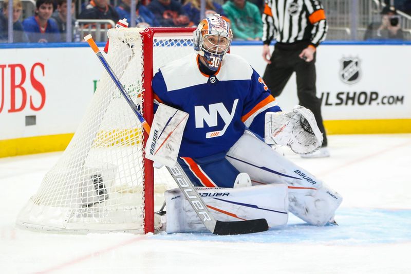 Feb 24, 2024; Elmont, New York, USA;  New York Islanders goaltender Ilya Sorokin (30) defends the net in the first period against the Tampa Bay Lightning at UBS Arena. Mandatory Credit: Wendell Cruz-USA TODAY Sports