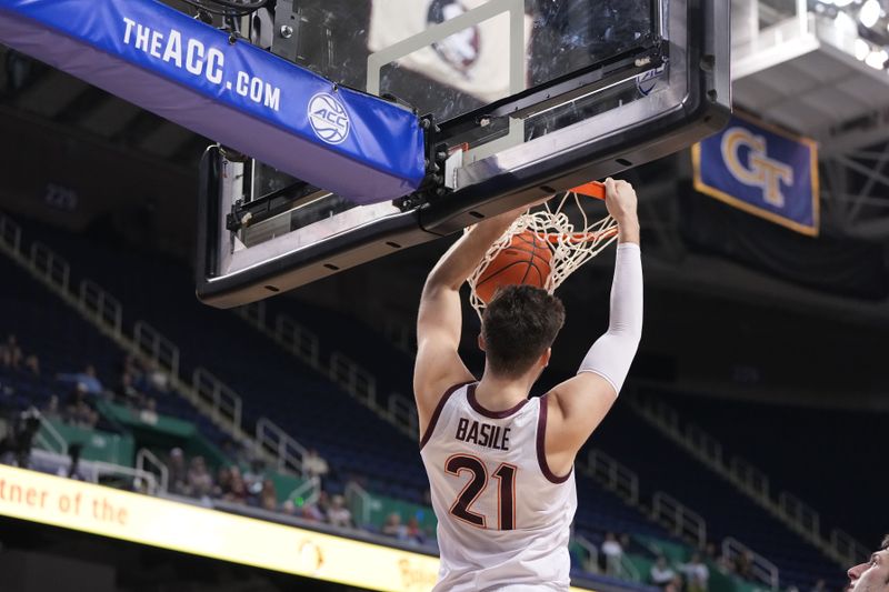 Mar 7, 2023; Greensboro, NC, USA; Virginia Tech Hokies forward Grant Basile (21) scores in the second half at Greensboro Coliseum. Mandatory Credit: Bob Donnan-USA TODAY Sports