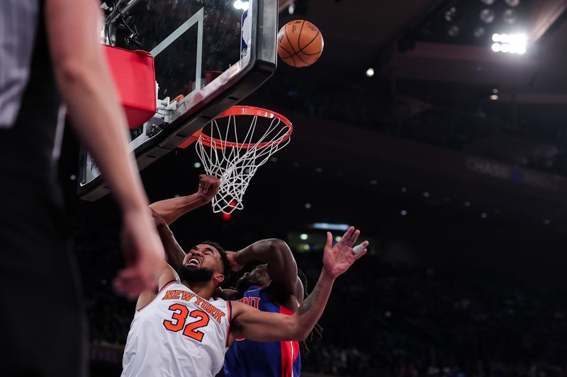 NEW YORK, NEW YORK - JANUARY 13: Karl-Anthony Towns #32 of the New York Knicks is fouled on a play that injured his finger in the first quarter against the Detroit Pistons at Madison Square Garden on January 13, 2025 in New York City. NOTE TO USER: User expressly acknowledges and agrees that, by downloading and or using this photograph, User is consenting to the terms and conditions of the Getty Images License Agreement. (Photo by Dustin Satloff/Getty Images)