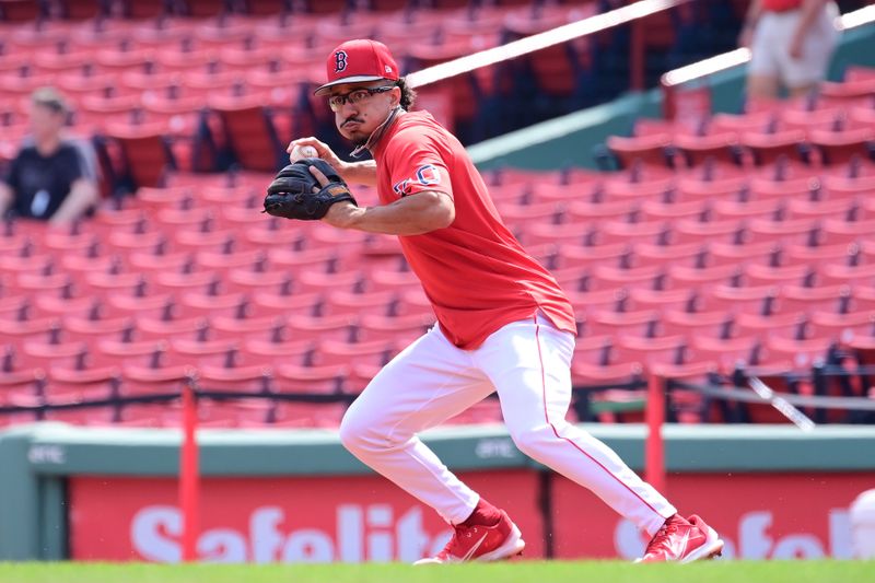 Aug 25, 2024; Boston, Massachusetts, USA; Boston Red Sox second baseman David Hamilton (70) warms up before a game against the Arizona Diamondbacks at Fenway Park. Mandatory Credit: Eric Canha-USA TODAY Sports