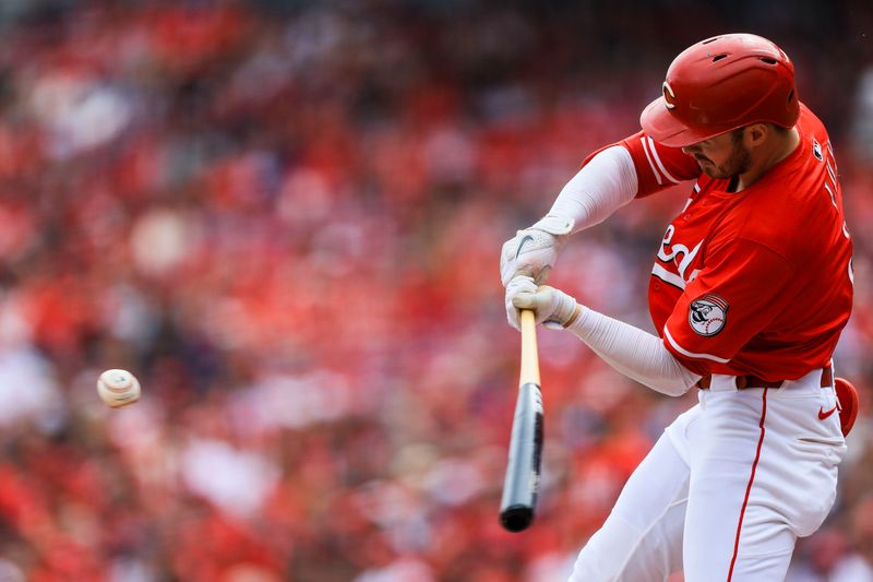 Sep 25, 2025; Cincinnati, Ohio, USA; Cincinnati Reds second baseman Gavin Lux (2) hits a single in the first inning against the Pittsburgh Pirates at Great American Ball Park. Mandatory Credit: Katie Stratman-Imagn Images