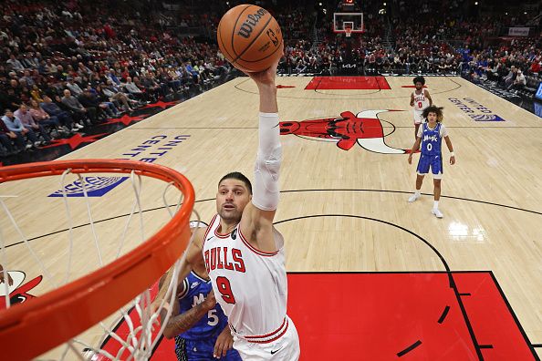 CHICAGO, IL - NOVEMBER 15: Nikola Vucevic #9 of the Chicago Bulls dunks the ball during the game against the Orlando Magic on November 15, 2023 at United Center in Chicago, Illinois. NOTE TO USER: User expressly acknowledges and agrees that, by downloading and or using this photograph, User is consenting to the terms and conditions of the Getty Images License Agreement. Mandatory Copyright Notice: Copyright 2023 NBAE (Photo by Jeff Haynes/NBAE via Getty Images)