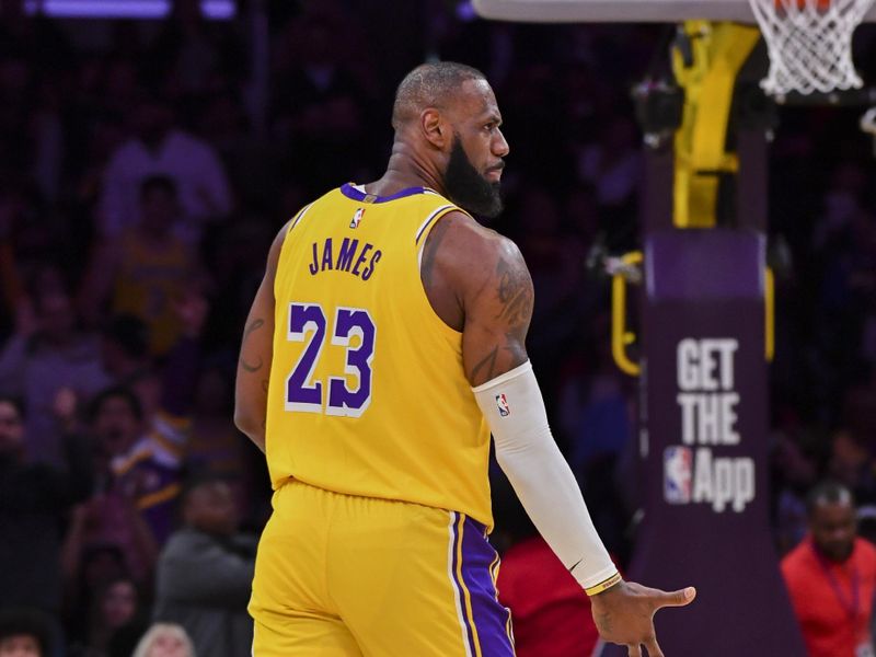 LOS ANGELES, CA - OCTOBER 22:  LeBron James #23 of the Los Angeles Lakers celebrates a three point basket during the game against the Memphis Grizzlies on October 22, 2024 at Crypto.com Arena in Los Angeles, California. NOTE TO USER: User expressly acknowledges and agrees that, by downloading and/or using this Photograph, user is consenting to the terms and conditions of the Getty Images License Agreement. Mandatory Copyright Notice: Copyright 2024 NBAE (Photo by Juan Ocampo/NBAE via Getty Images)