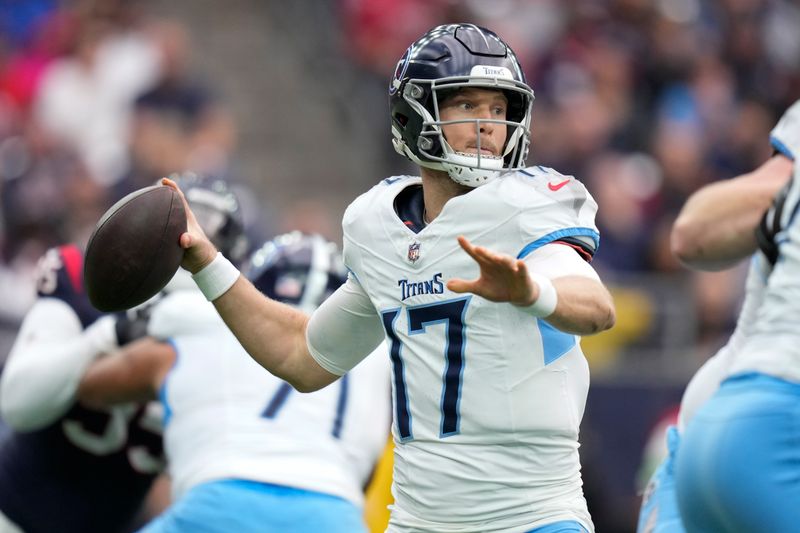 Tennessee Titans quarterback Ryan Tannehill (17) looks to throw a pass during the first half of an NFL football game against the Houston Texans, Sunday, Dec. 31, 2023, in Houston. (AP Photo/Eric Christian Smith)