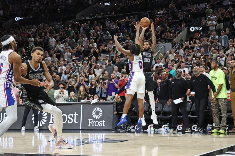 SAN ANTONIO, TX - APRIL 7: Julian Champagnie #30 of the San Antonio Spurs scores the go ahead 3 point basket during the game against the Philadelphia 76ers on April 7, 2024 at the Frost Bank Center in San Antonio, Texas. NOTE TO USER: User expressly acknowledges and agrees that, by downloading and or using this photograph, user is consenting to the terms and conditions of the Getty Images License Agreement. Mandatory Copyright Notice: Copyright 2024 NBAE (Photos by Tim Heitman/NBAE via Getty Images)