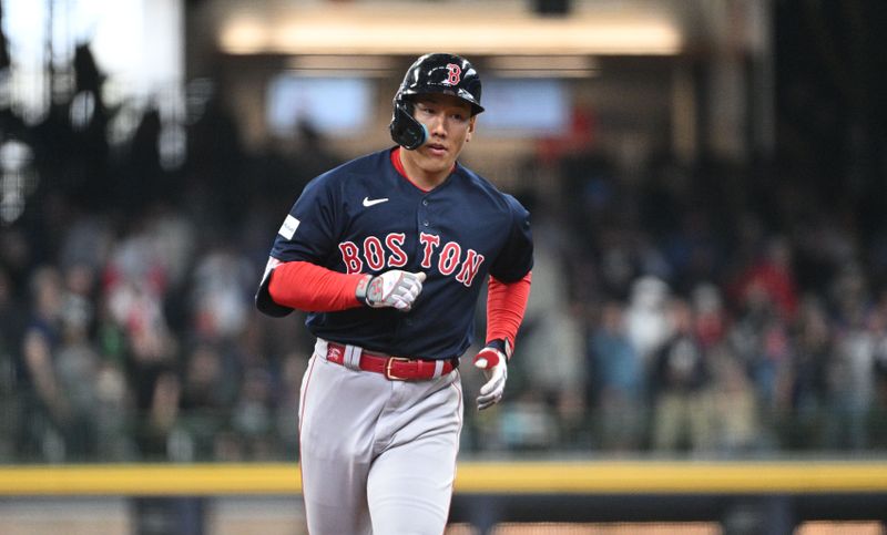 Apr 23, 2023; Milwaukee, Wisconsin, USA; Boston Red Sox left fielder Masataka Yoshida (7) rounds the bases after hitting a home run against the Milwaukee Brewers in the eighth inning at American Family Field. Mandatory Credit: Michael McLoone-USA TODAY Sports