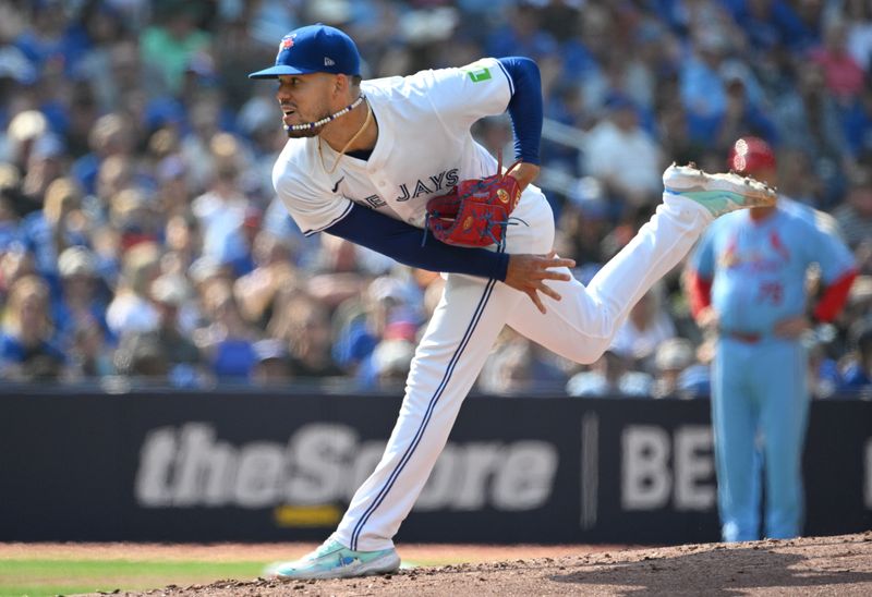 Sep 14, 2024; Toronto, Ontario, CAN;  Toronto Blue Jays starting pitcher Jose Berrios (17) delivers a pitch against the St. Louis Cardinals in the second inning at Rogers Centre. Mandatory Credit: Dan Hamilton-Imagn Images