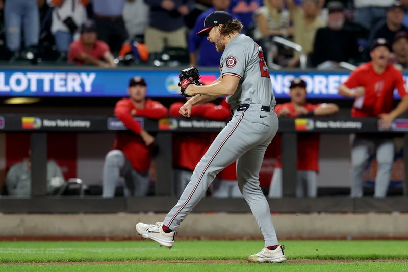 Sep 16, 2024; New York City, New York, USA; Washington Nationals starting pitcher Jake Irvin (27) reacts after getting New York Mets third baseman Mark Vientos (not pictured) to ground out with the bases loaded to end the fourth inning at Citi Field. Mandatory Credit: Brad Penner-Imagn Images