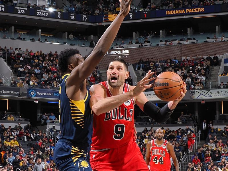 INDIANAPOLIS, IN - JANUARY 8: Nikola Vucevic #9 of the Chicago Bulls drives to the basket during the game against the Indiana Pacers on January 8, 2025 at Gainbridge Fieldhouse in Indianapolis, Indiana. NOTE TO USER: User expressly acknowledges and agrees that, by downloading and or using this Photograph, user is consenting to the terms and conditions of the Getty Images License Agreement. Mandatory Copyright Notice: Copyright 2025 NBAE (Photo by Ron Hoskins/NBAE via Getty Images)