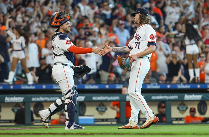 Jun 22, 2024; Houston, Texas, USA; Houston Astros catcher Yainer Diaz (21) celebrates with relief pitcher Josh Hader (71) after the game against the Baltimore Orioles at Minute Maid Park. Mandatory Credit: Troy Taormina-USA TODAY Sports